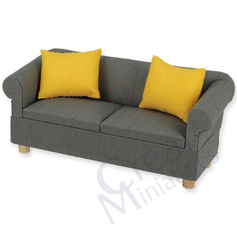 Sofa grey and 2 yellow pillows