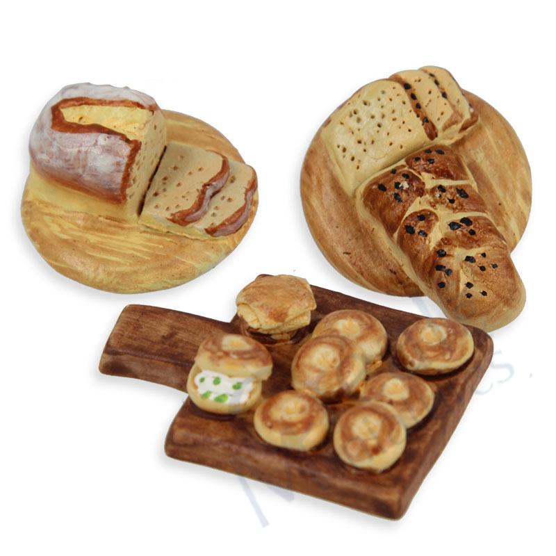 Bread on cutting board ass.