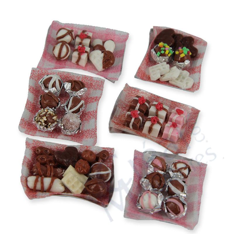 Chocolates on plates ass