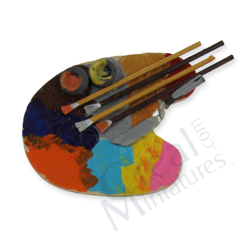 Artist s palette and 4 brushes
