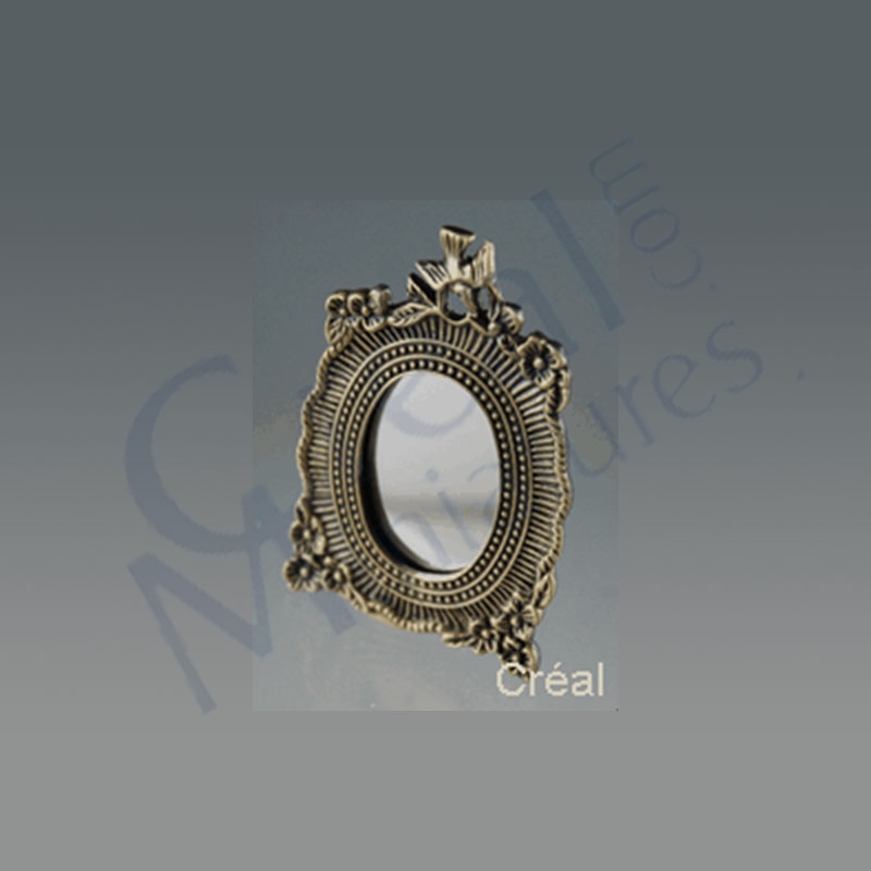 Floral antic brass mirror