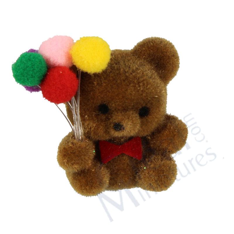 Peluche ours brun avec ballons