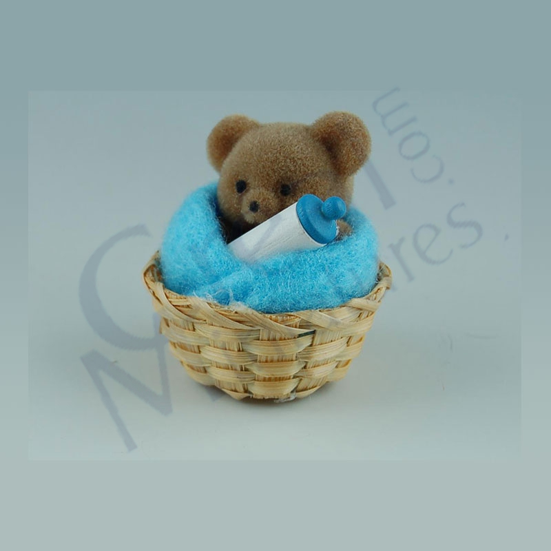 Bear w.blue towel in basket