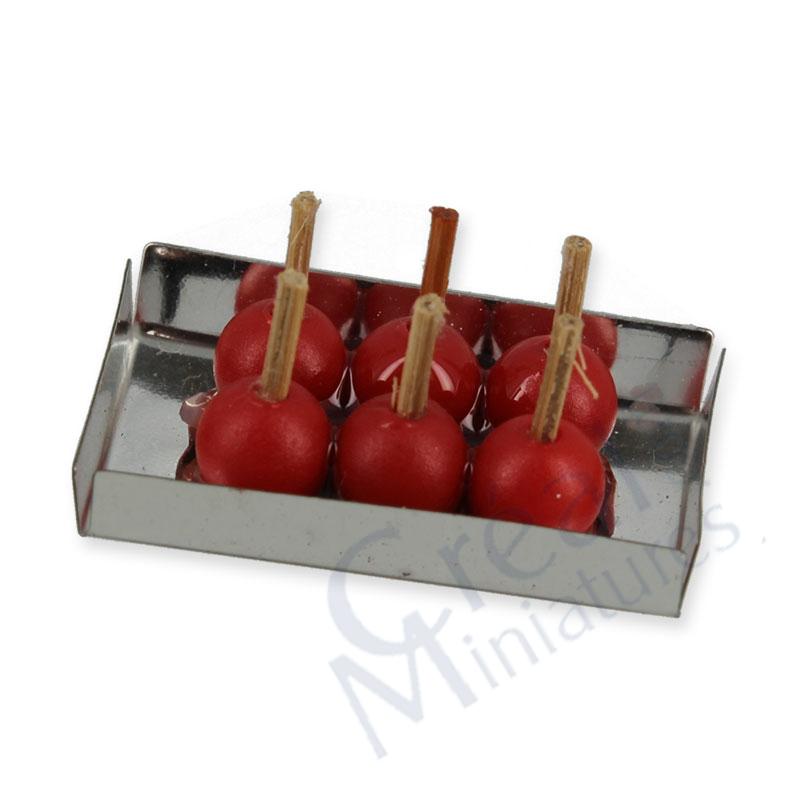 Candy apples red on plate