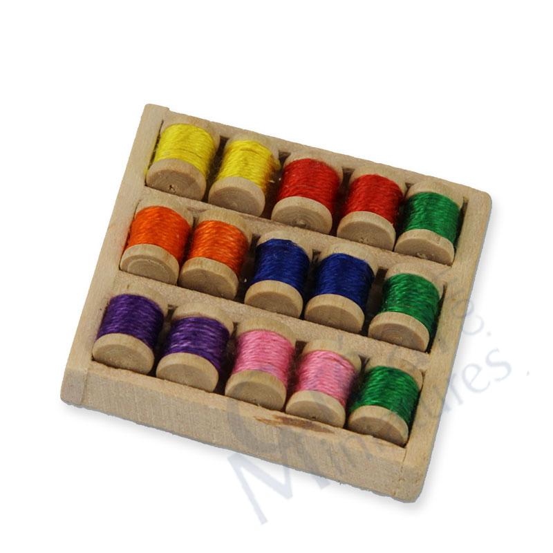 15 spools of thread in box