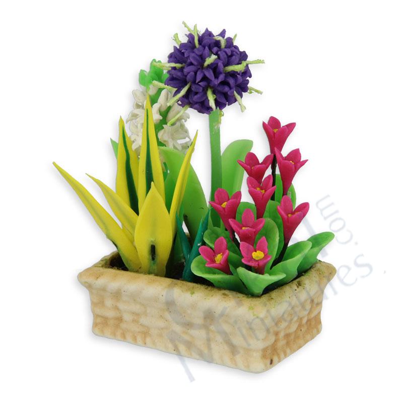 Floral arrangement in planter