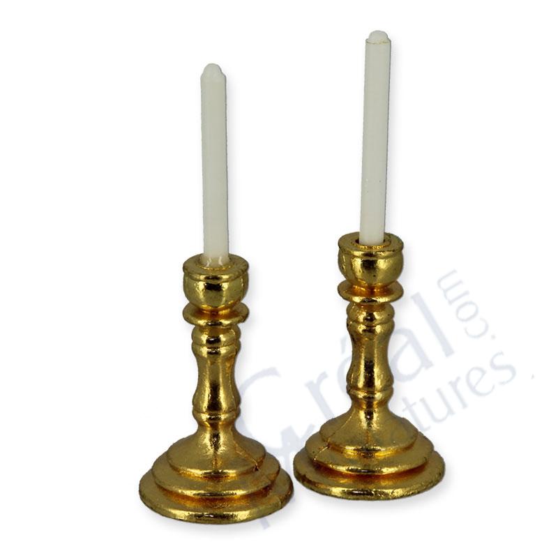 2 brass candlesticks white