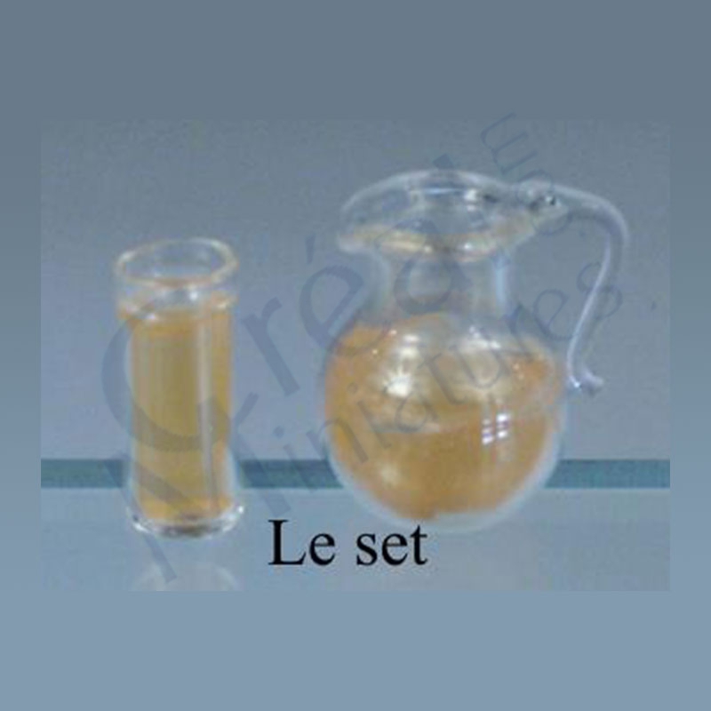 Cruche et verre jus d'orange