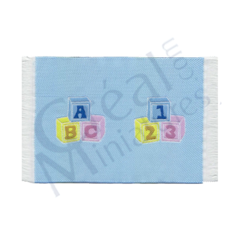 Tapis bleu enfant avec cubes